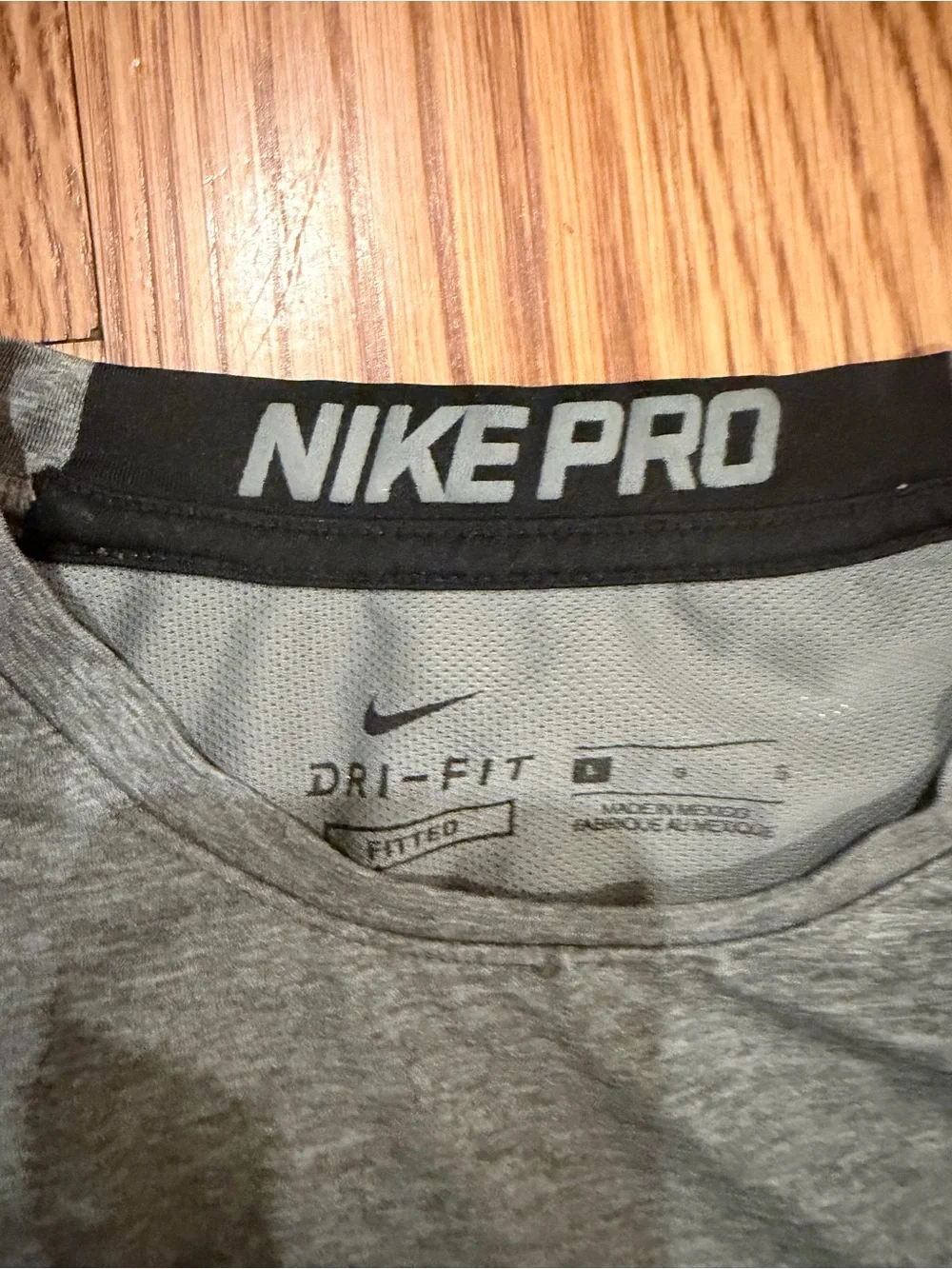 Nike Gray Short Sleeve Dri-Fit Performance Tee with White Swoosh